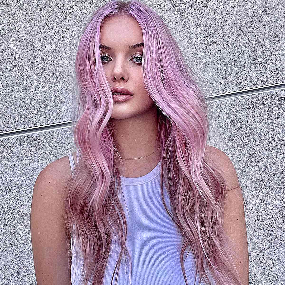 The Prettiest Pink Long Hair with Waves and a Center Part with Dark roots