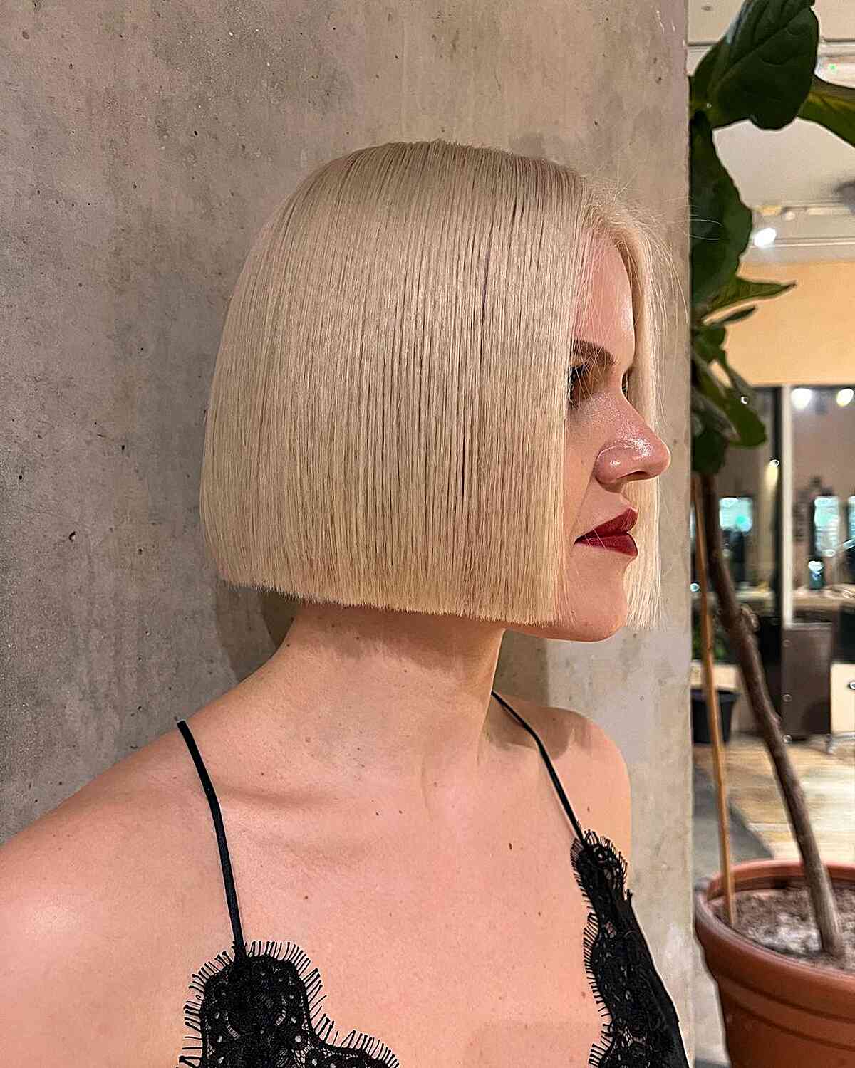 The Straightest One-Length Blunt Cut Bob for women with blonde hair
