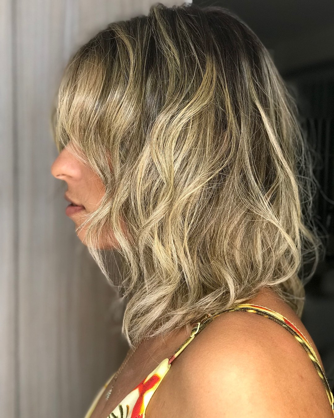 Shoulder-Grazing Cut for Thick Beachy Waves