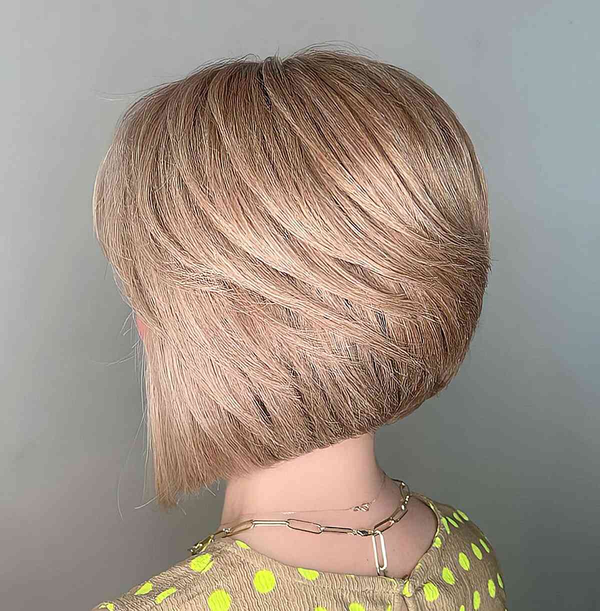 Neck-Length Thick Concave Bob with Angled Feathery Layers