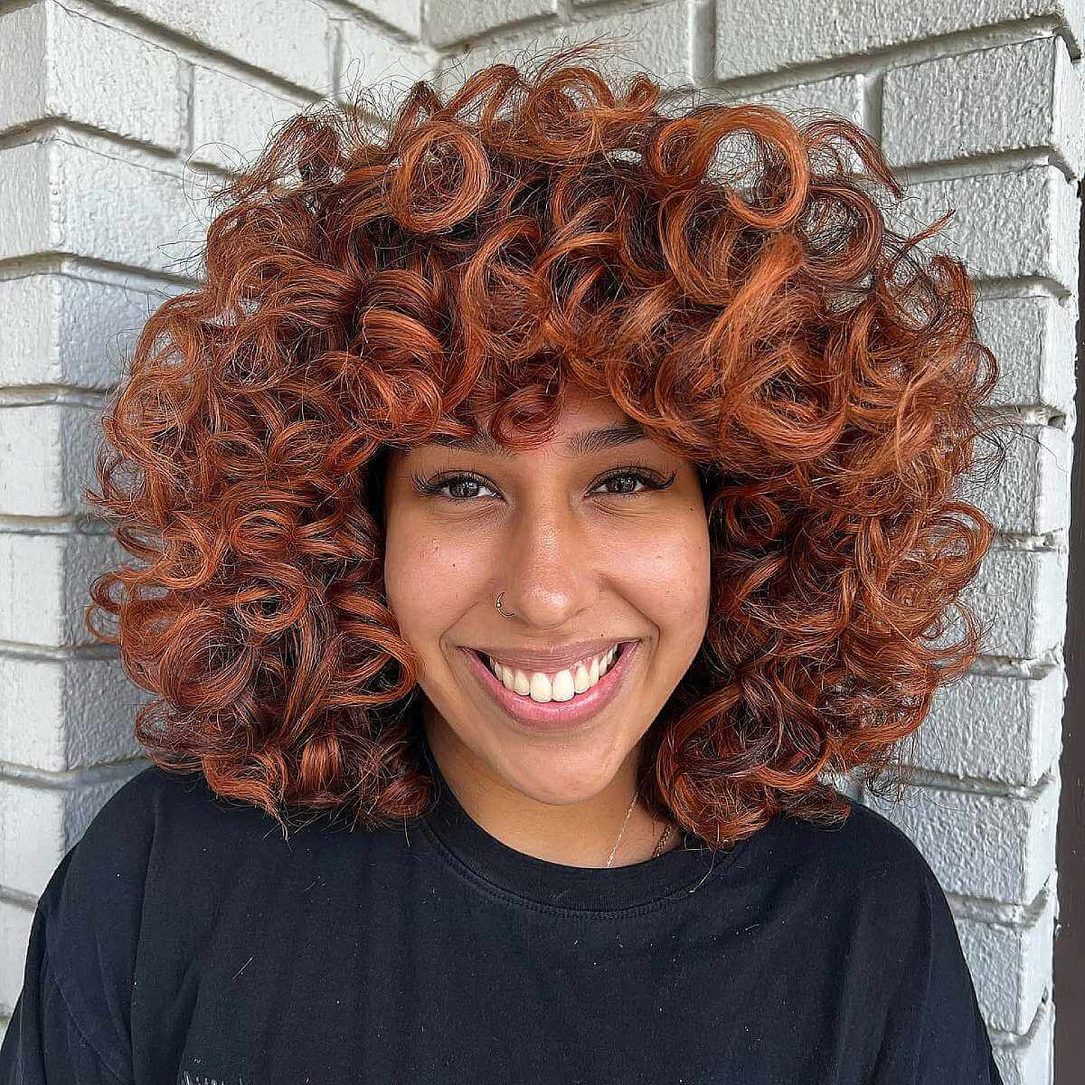 Thick Copper Rezo Cut Curls with Bangs