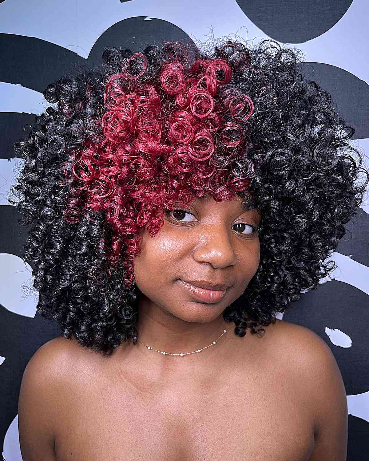 Thick Curls with a Pop of Color for African-American Ladies with long thick curly hair