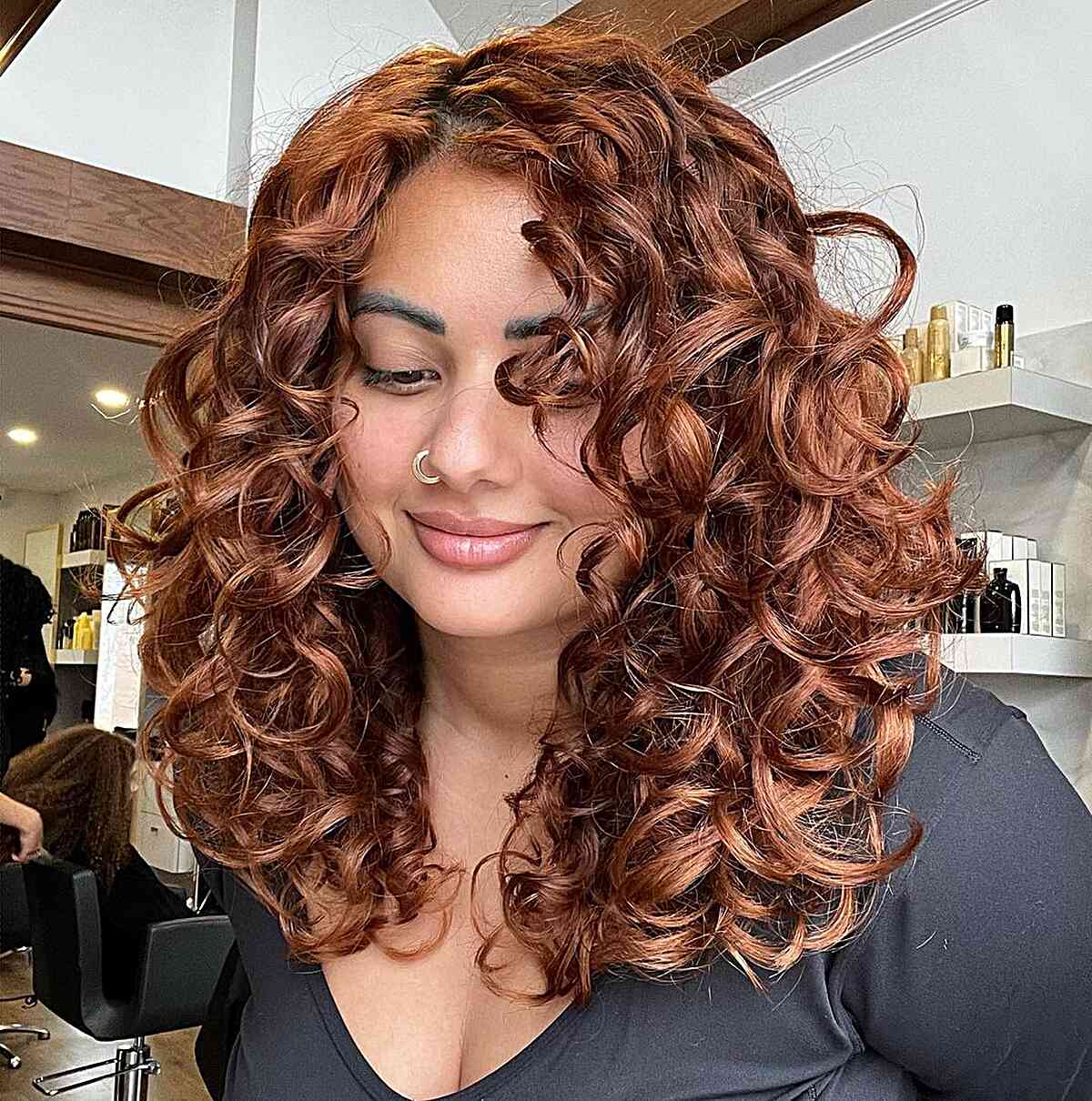 Thick Curly Hair with Hidden Layers for women with round faces