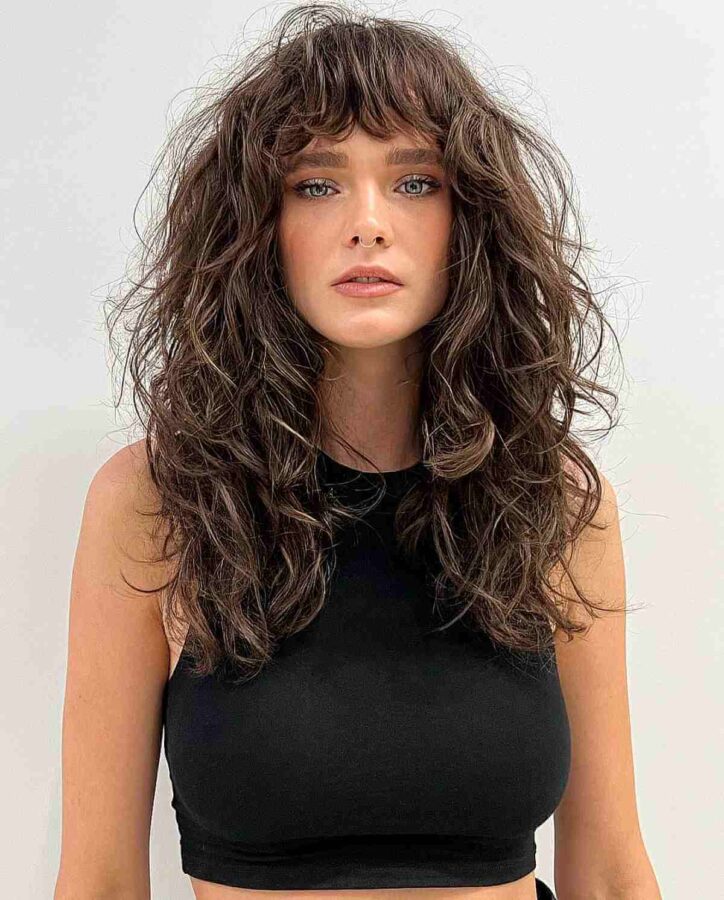 32 Ways to Pair Wavy Hair with Bangs for a SuperFlattering Look