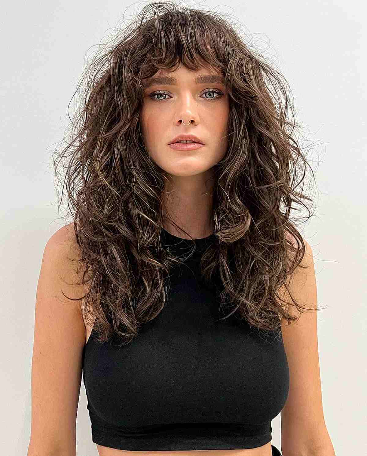 Thick Curly Waves with Highlights and Bangs