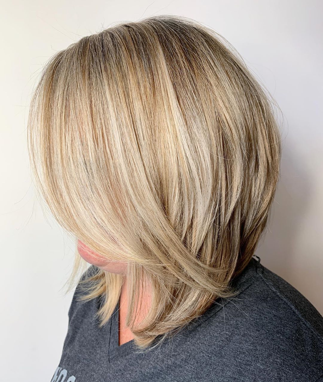 Flattering Thick Layered Bob on Blonde Hair