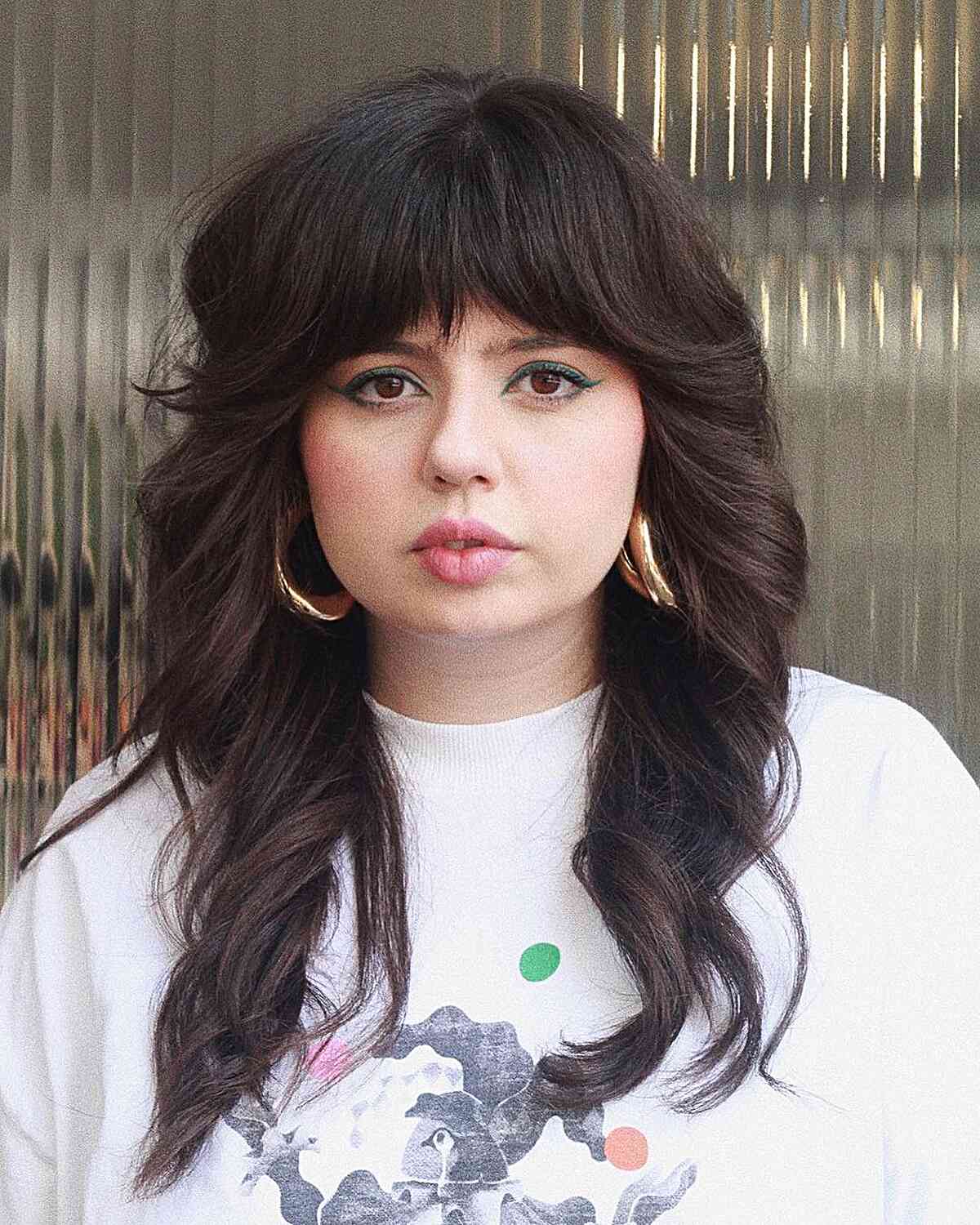 Thick Mid-Length Hair with Bangs for Fuller Face Shapes