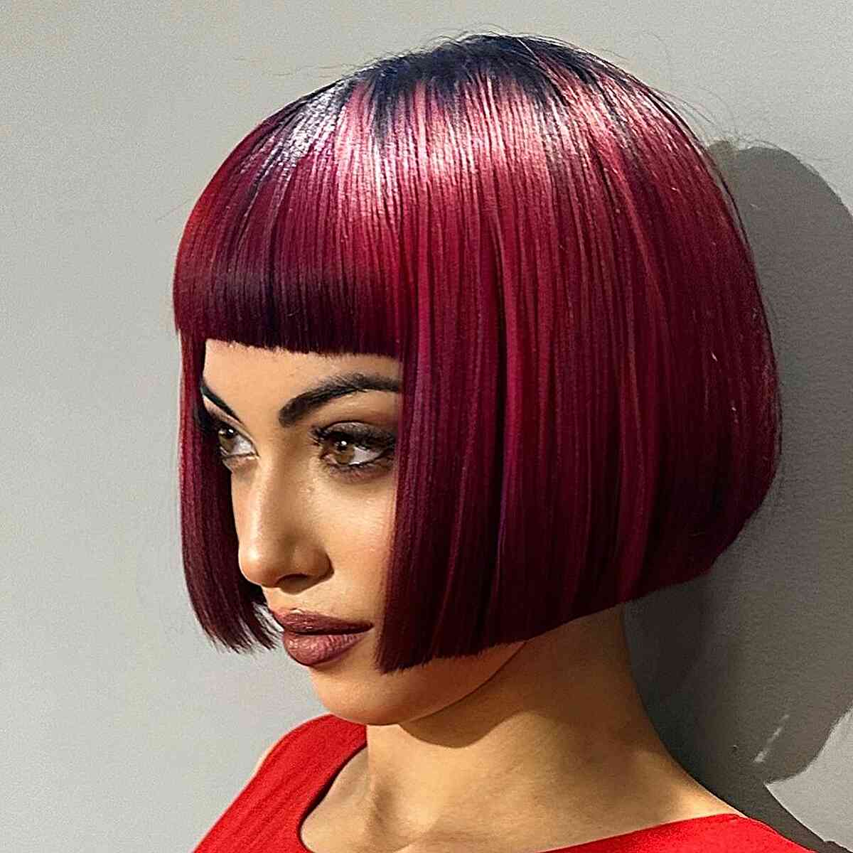 Thick Red Bob with Black Roots