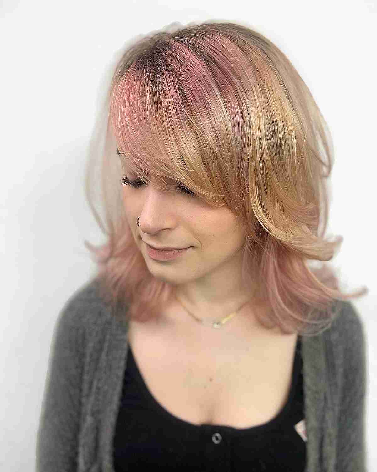 Thick Side Bangs and Medium-Length Layers on Edgy Blonde Hair with Pink Highlights