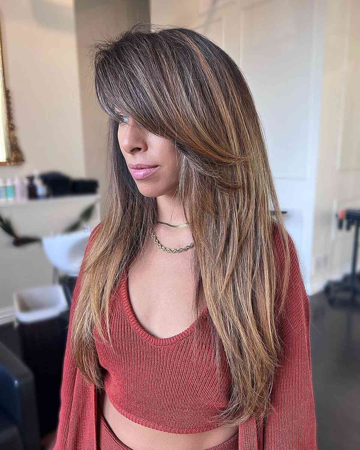Thick Straight Layered Cut with Long Bangs