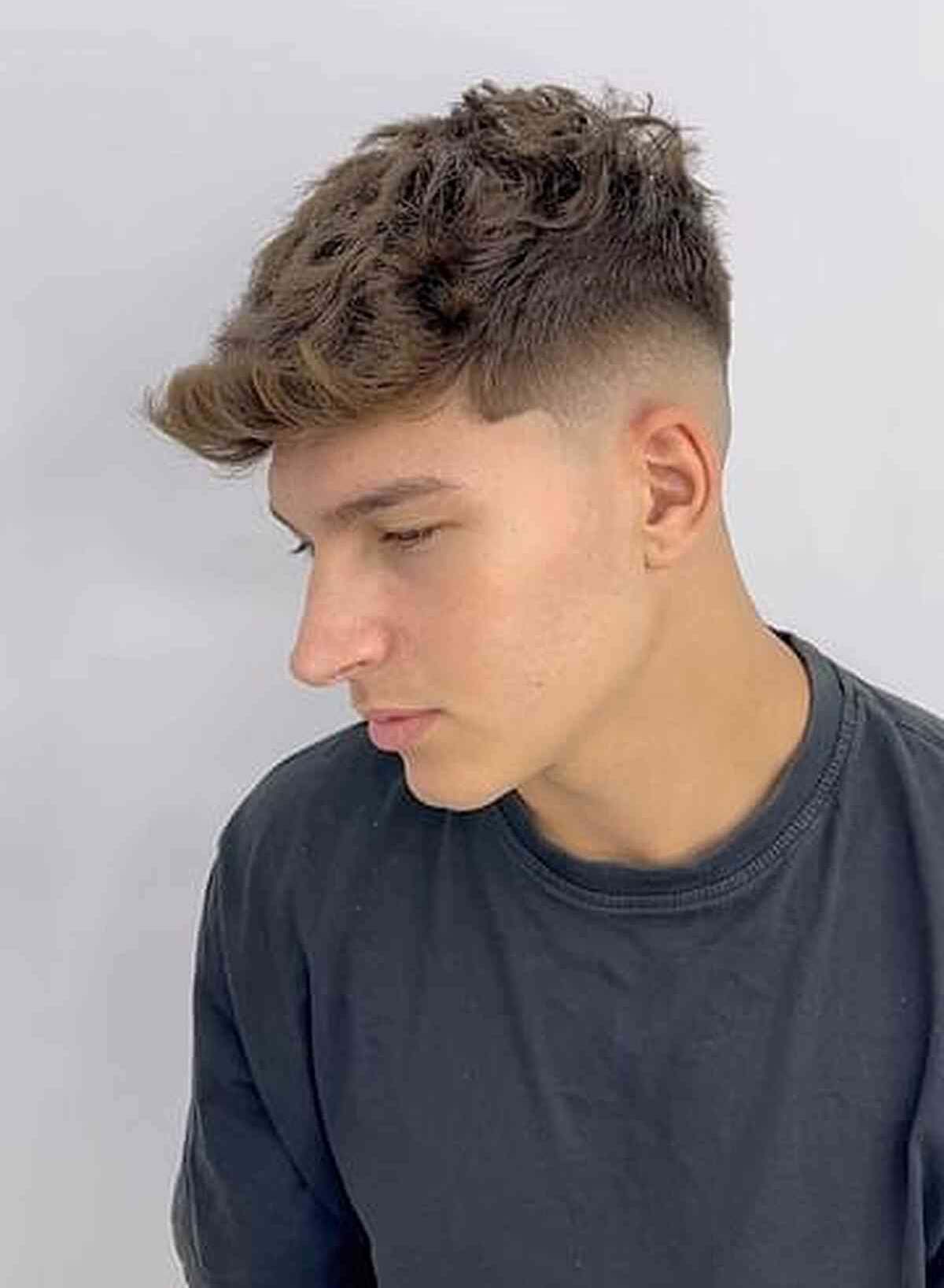 Thick Wavy Hair with a Mid Fade for Dudes