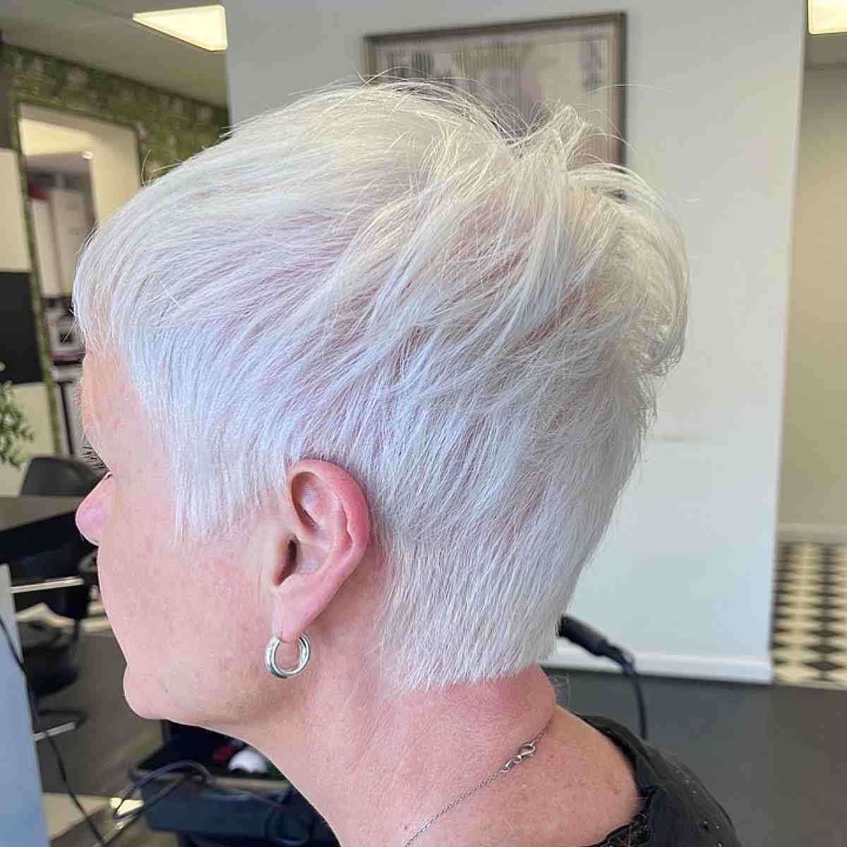 Thinning White-Blonde Pixie Crop with Piecey Layers