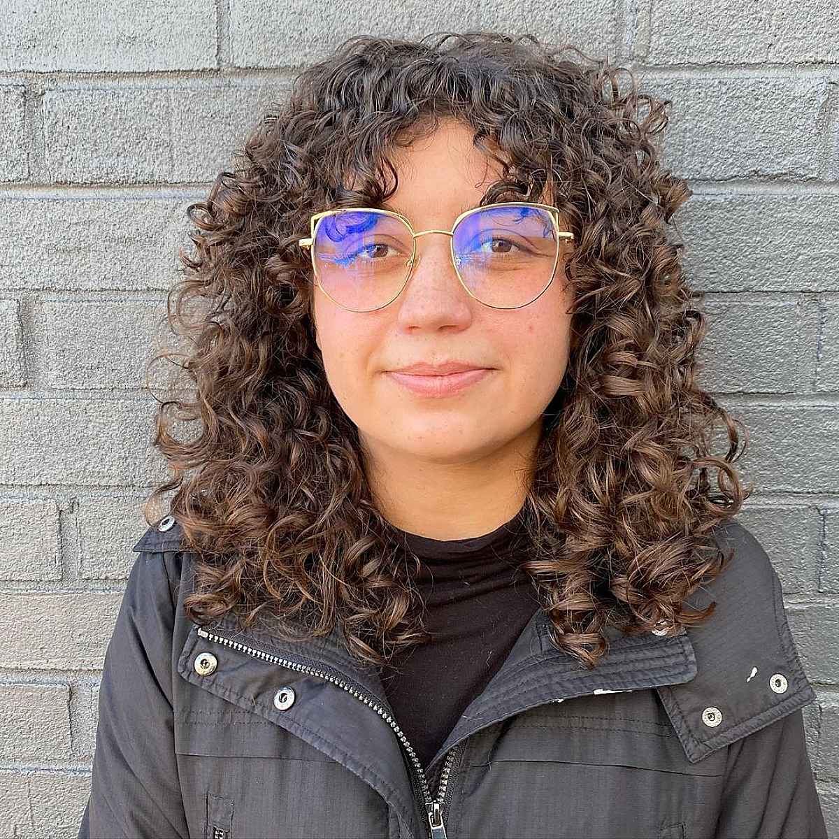 Tight Curls with Short Curtain Bangs