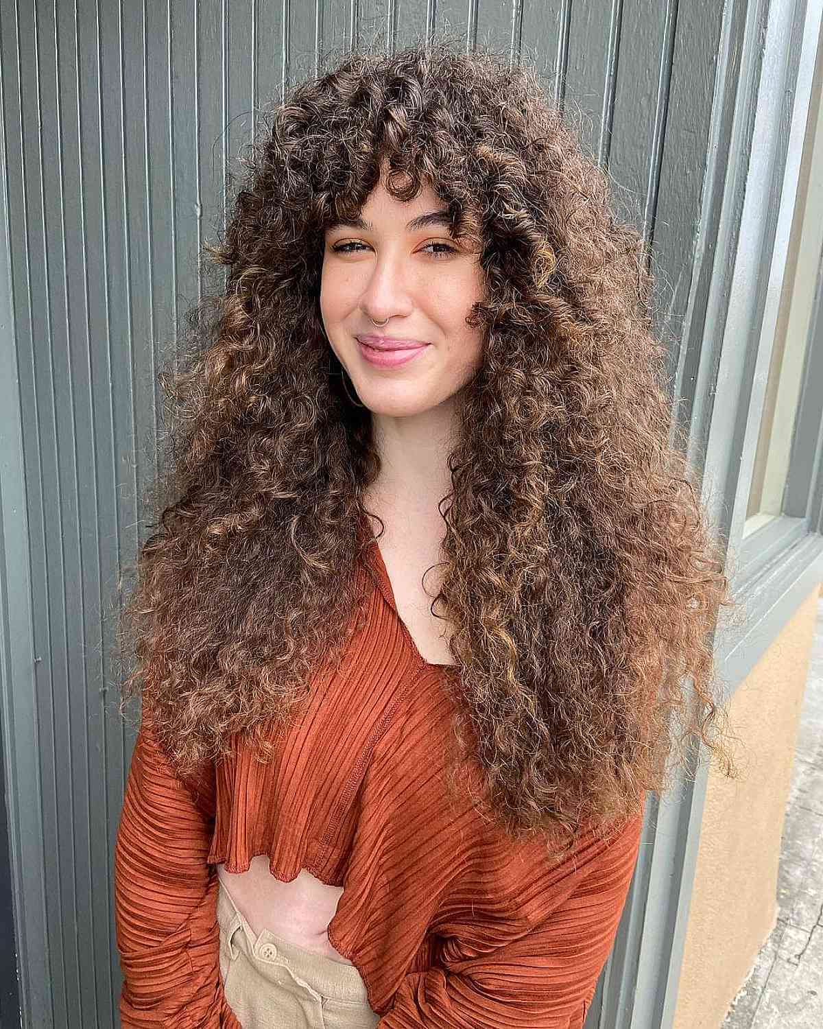 Tight Ringlets with Bangs on Long Shaggy Hair