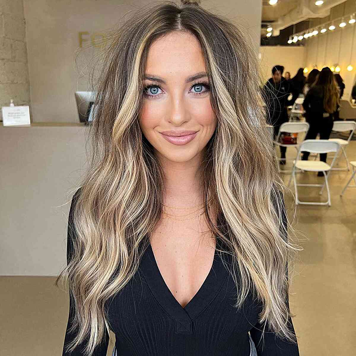 Long-Length Tousled Brown Hair with Blonde Money Piece Bronde Balayage