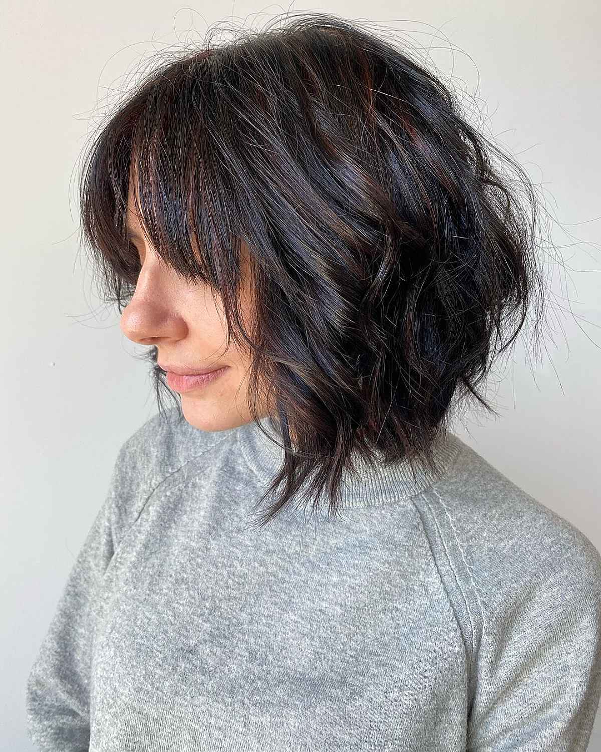 Tousled Choppy Bob with Bangs for Thick Hair
