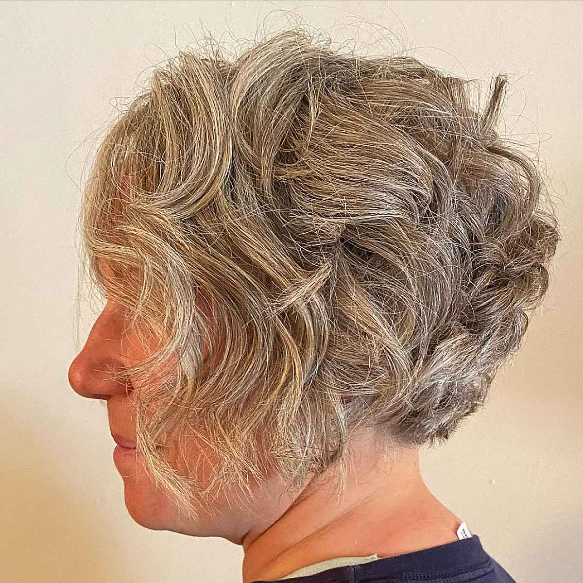 Tousled Layered Hairstyle on Women's Short Silver Hair