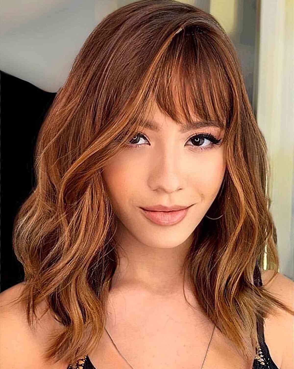 Tousled Mid-Length Cut with Subtly Swept Bangs for women with fine hair