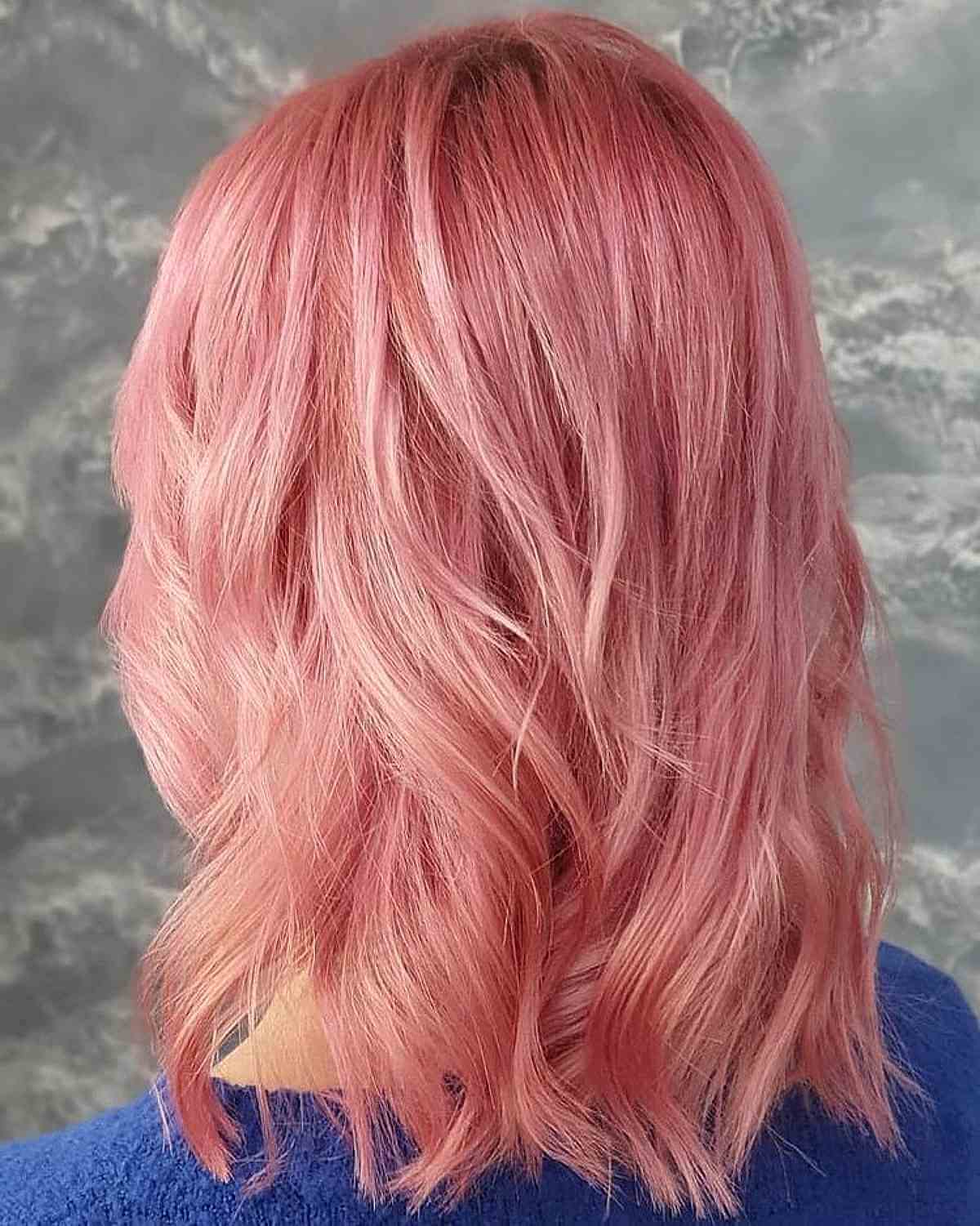 Tousled Shoulder-Length Lighter Pink Hair