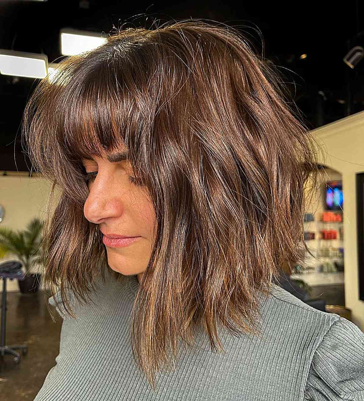 Face-Framing Tousled Textured Long Bob with Straight Bangs and Textured Ends