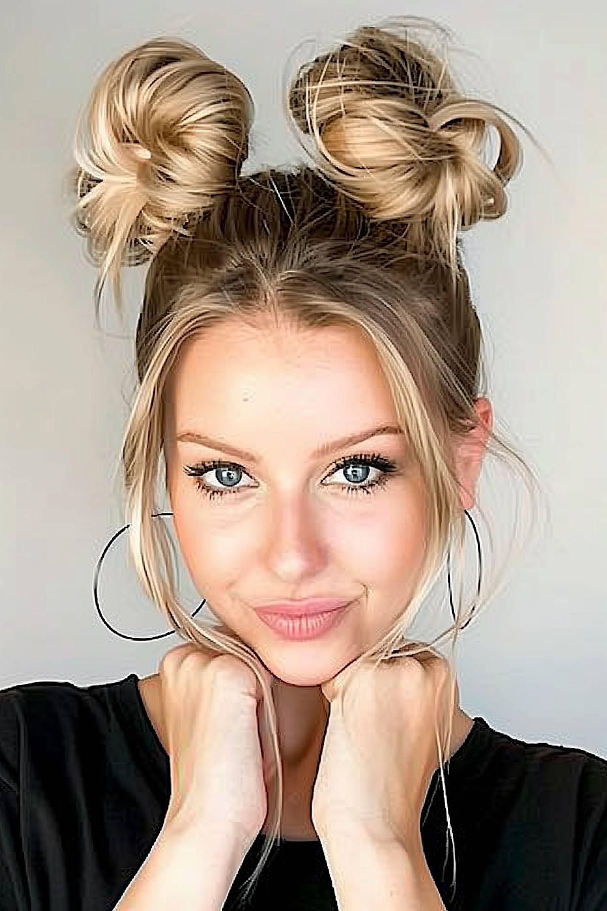 Charming bubble buns hairstyle for a playful and stylish updo perfect for medium-length hair.