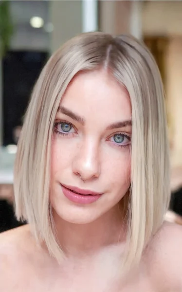 A Trendy blunt cut bob with a middle part
