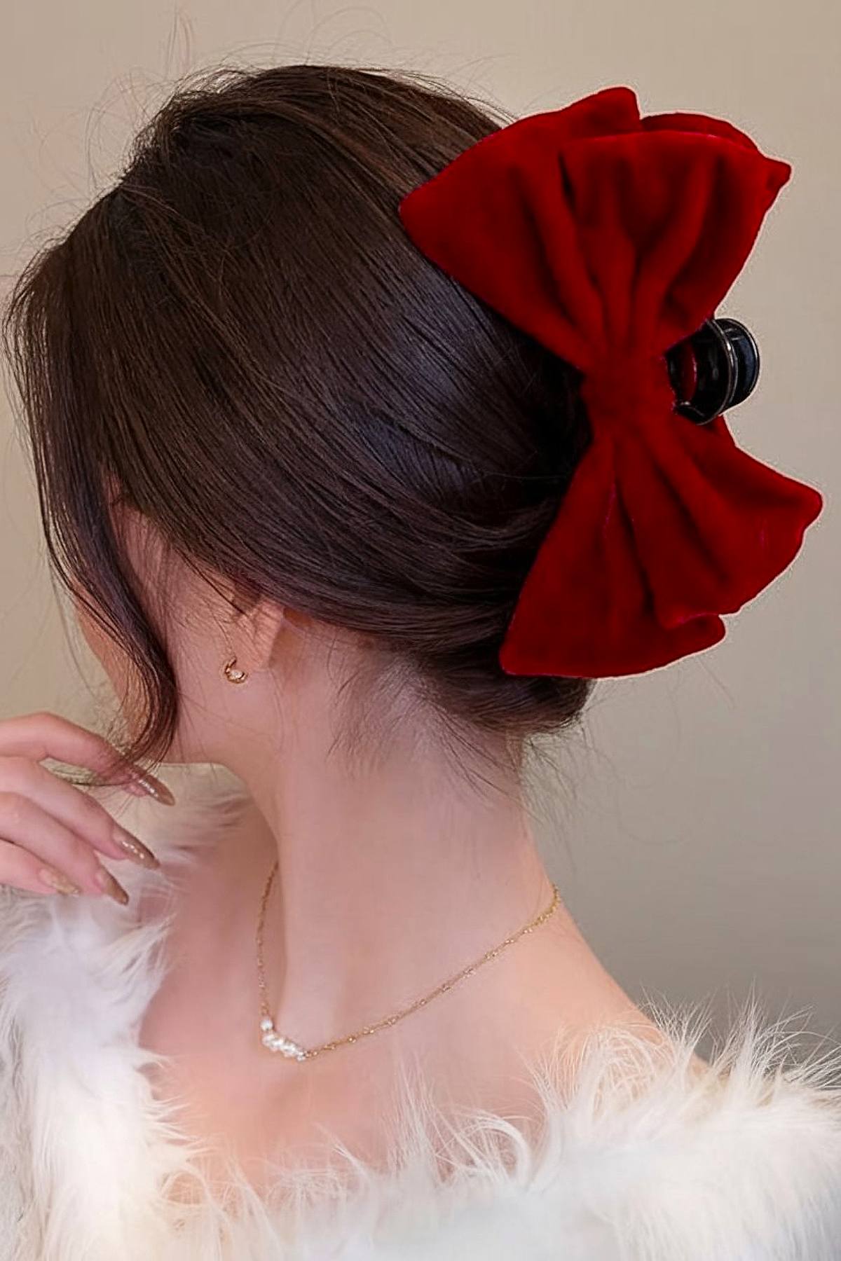 Trendy Christmas claw clip updo with velvet bow