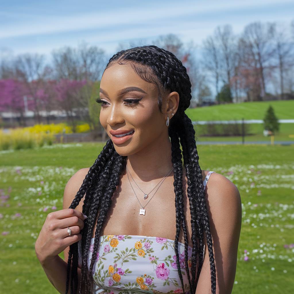 Long, sleek box braids with baby hairs styled, trendy spring break hairstyle