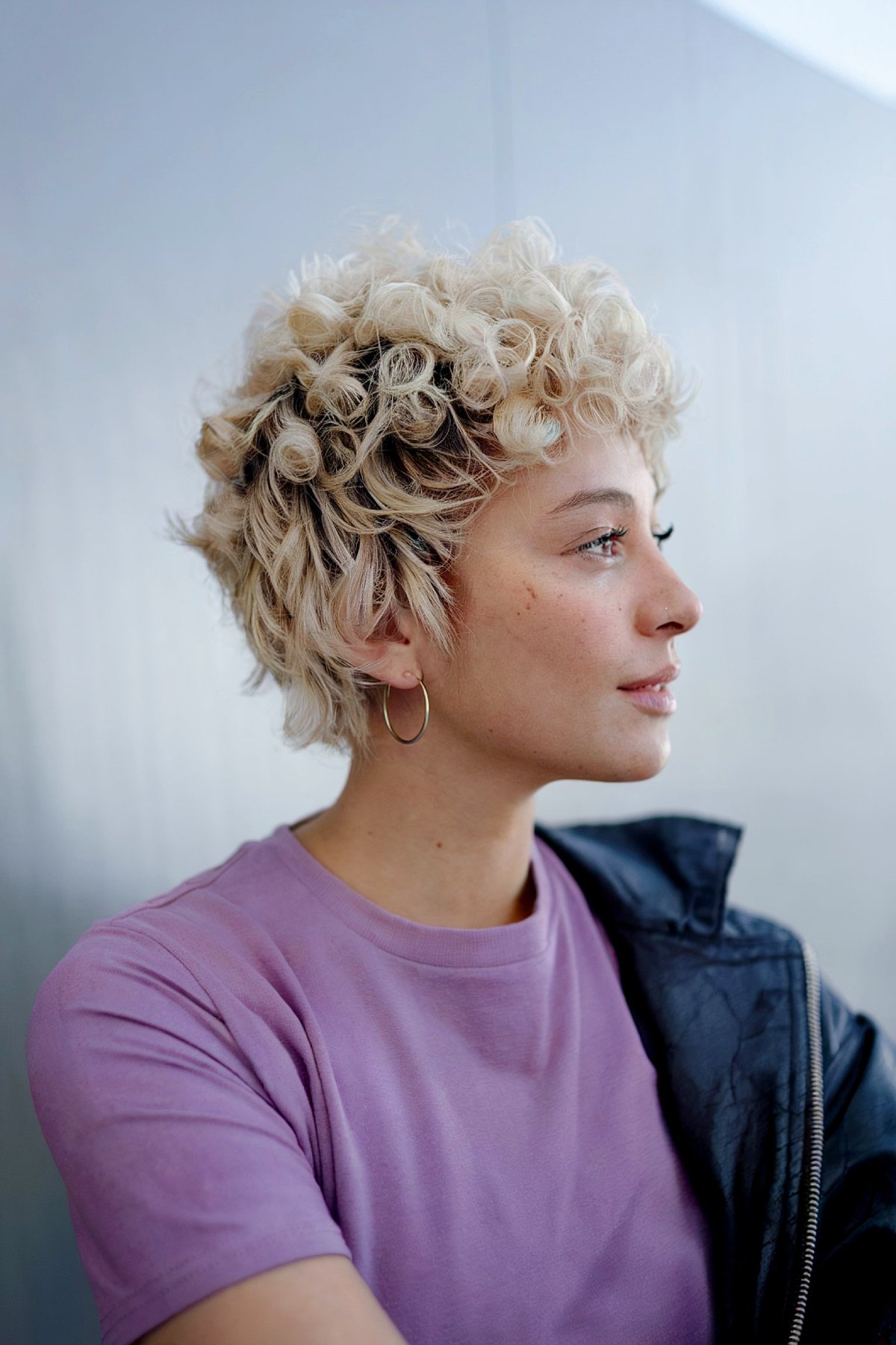 Very short curly mullet with cropped sides