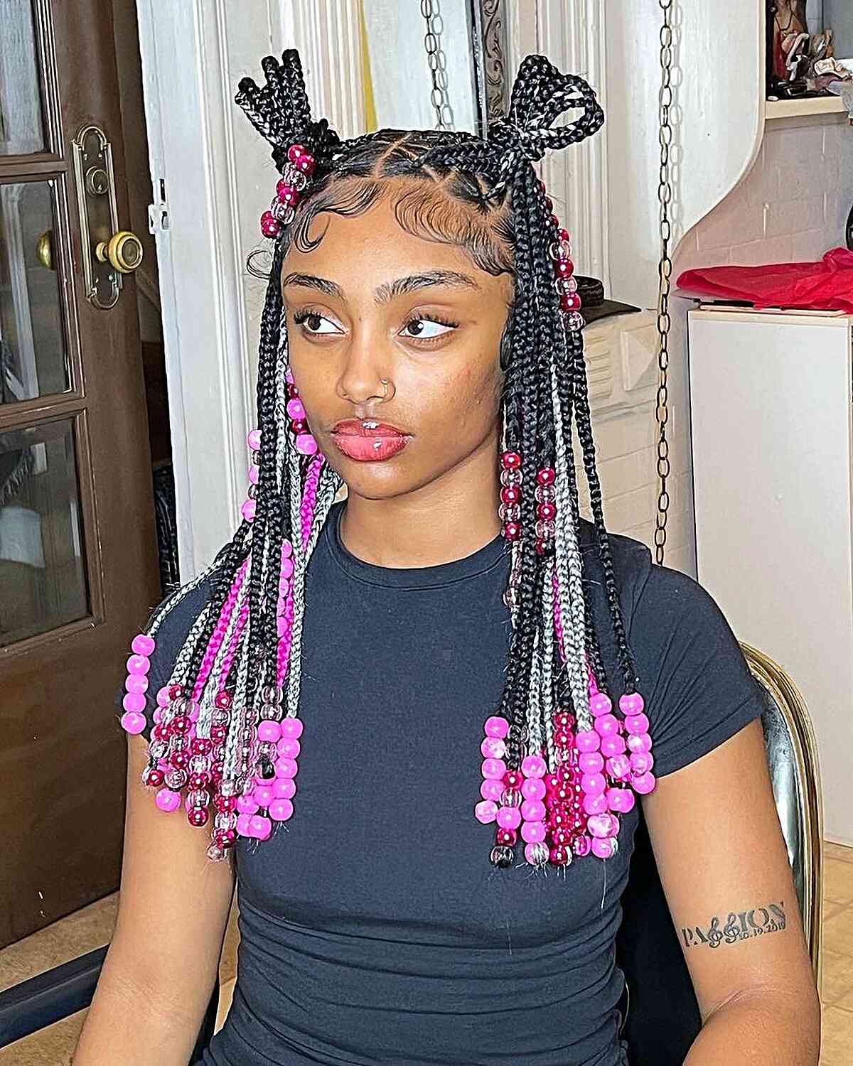 Chest-Length Triangle Knotless Braids with Pink Beads