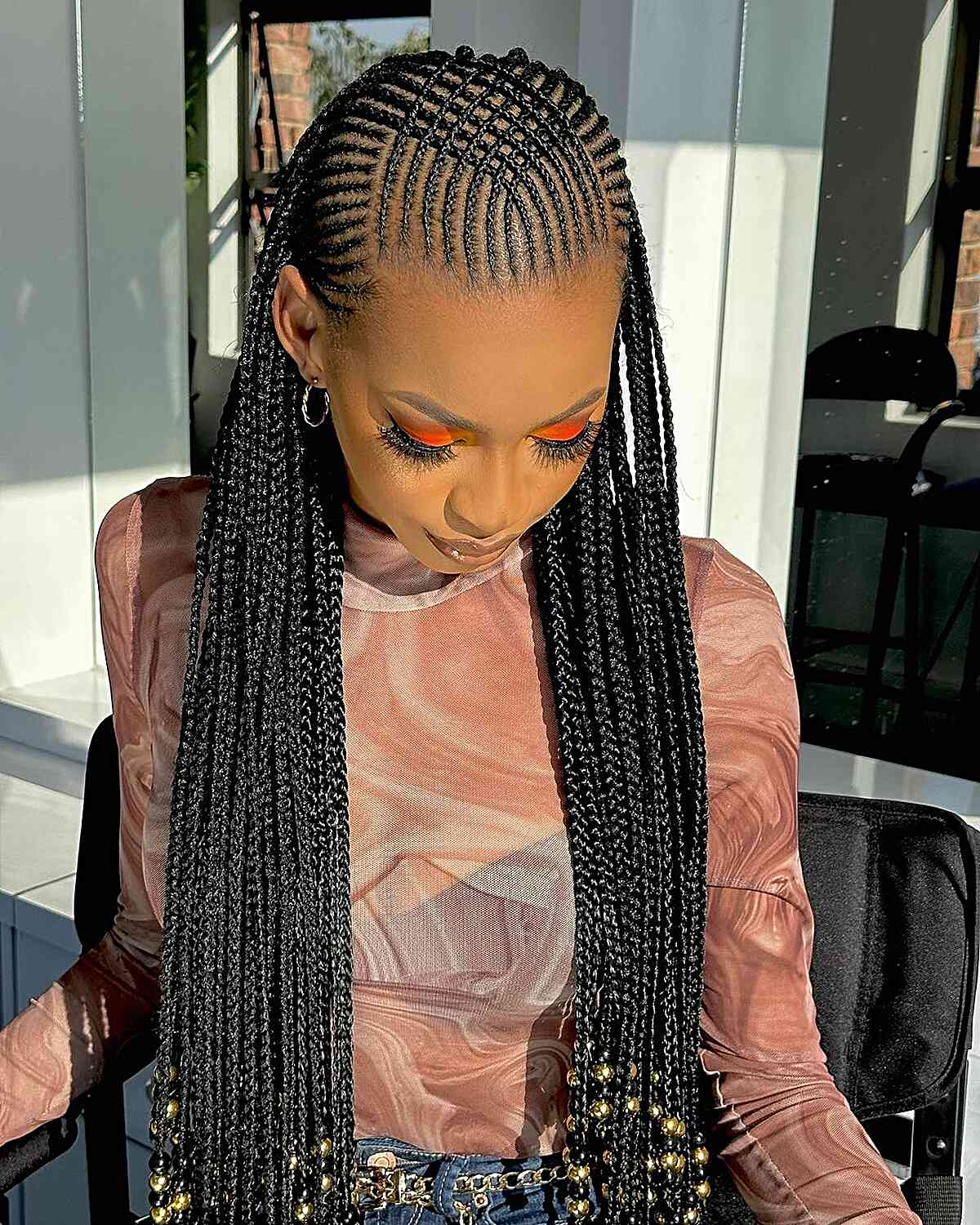 Tribal Cornrows with Feed-In Long Braids