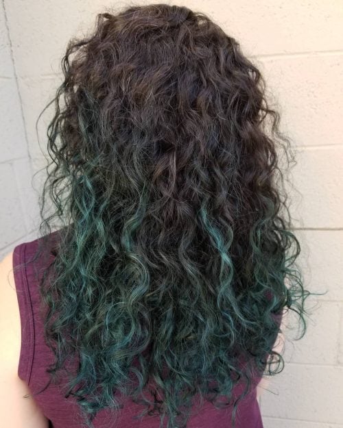 Curly hair turquoise ombre