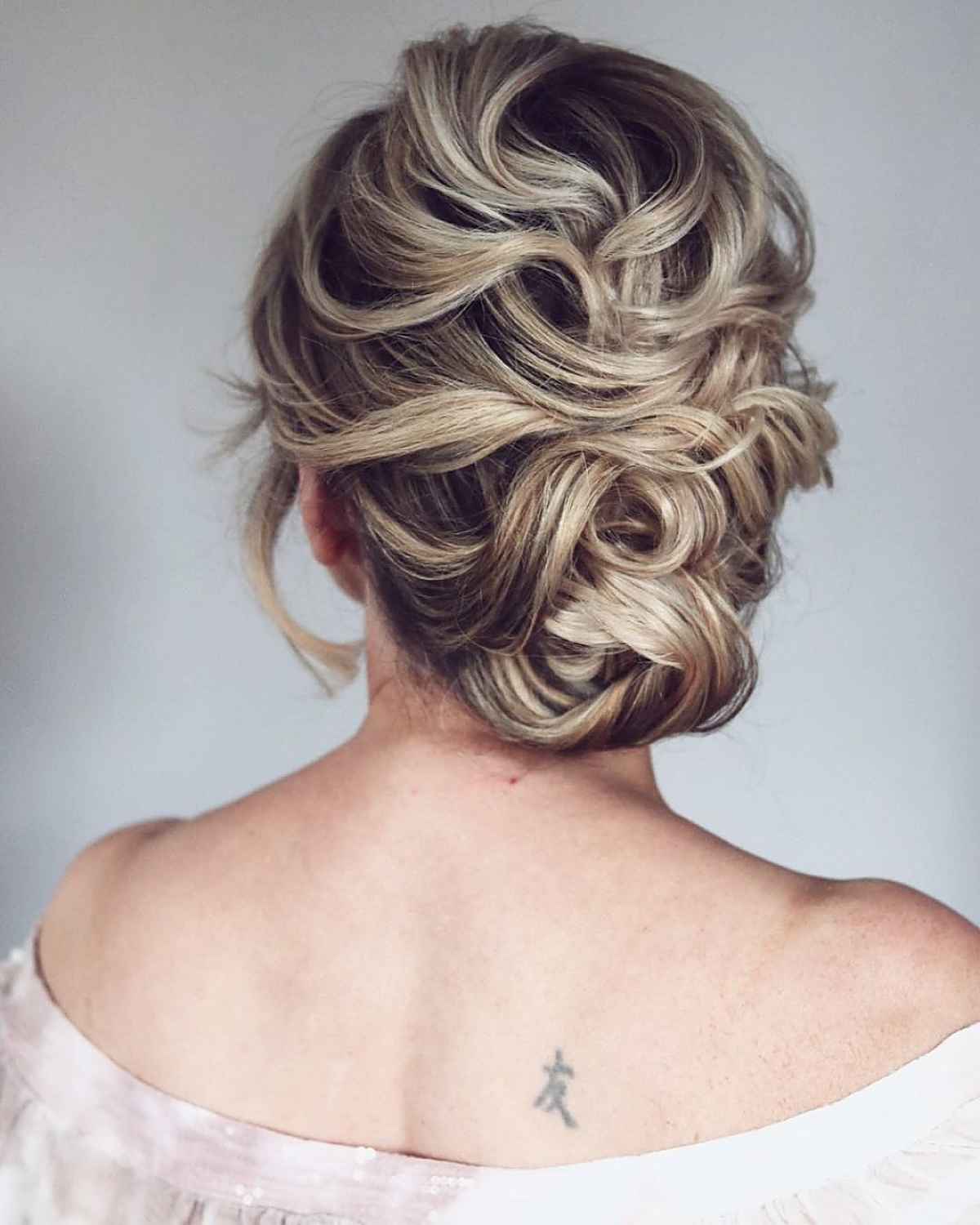 Twisted bouffant updo for short hair