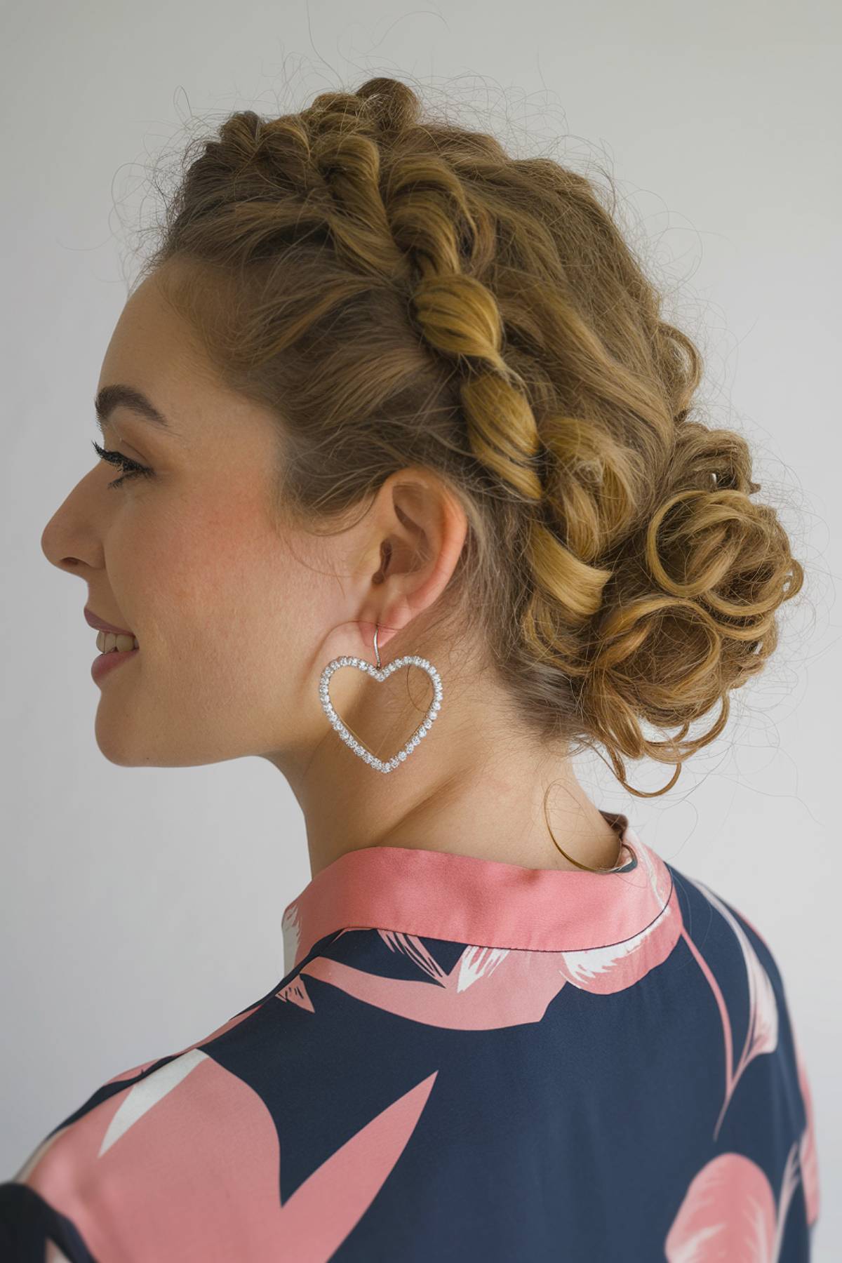 Twisted curly hair bun with soft, defined curls for an elegant updo