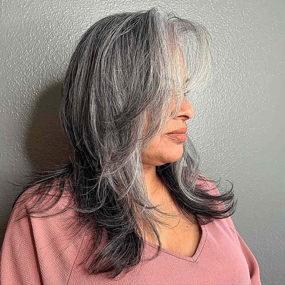 Two Tone Grey Hair with Medium-Length Butterfly Layers for Older Ladies