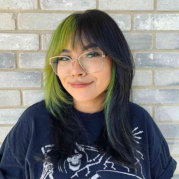 A Two-Toned Medium-Length Choppy Shag with Bangs for Young Women's Round Face Shapes