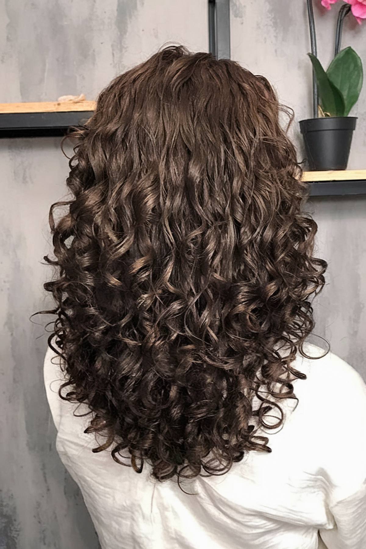 U shape curly haircut for defined curls