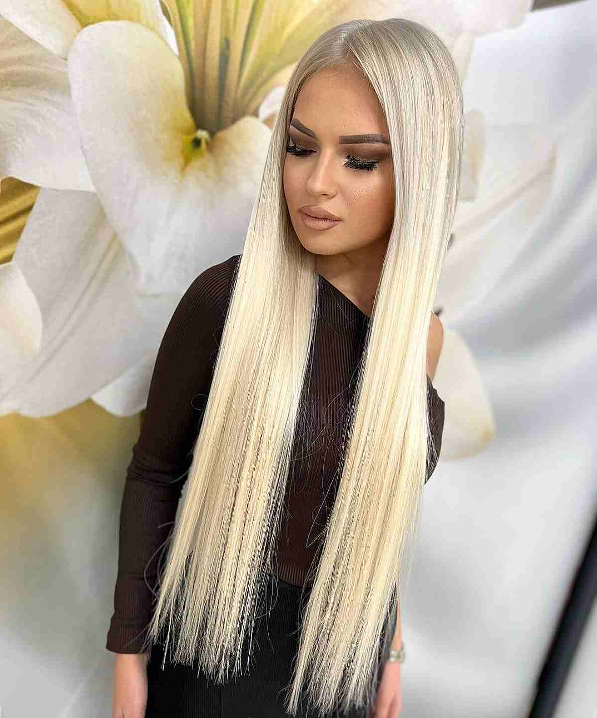Ultra-Sleek Long Straight Blonde Hair with a Center Part
