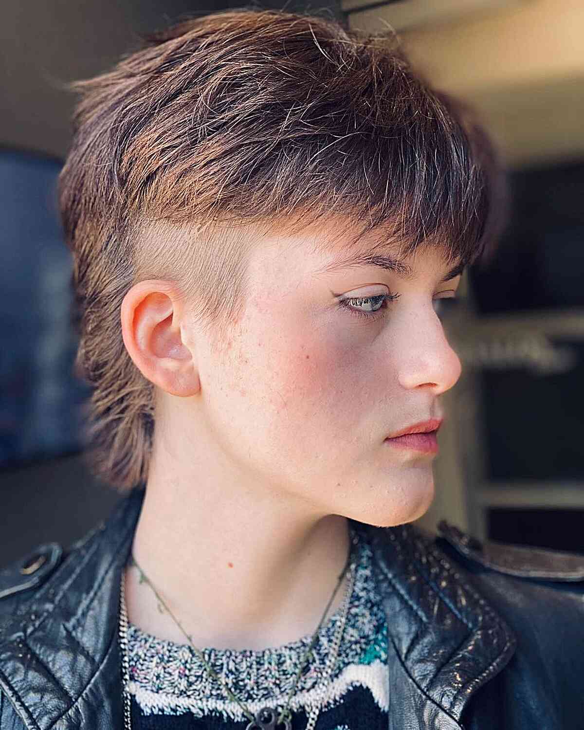 Undercut 90s-Inspired Mullet with Bangs for Women with an edgy style