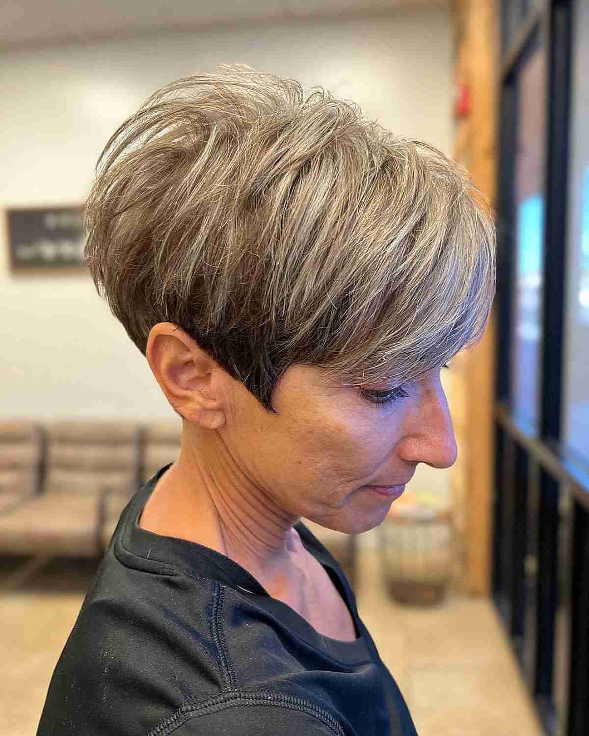 Adorable Undercut Pixie with Textured Choppy Layers for Fifty-Year-Olds