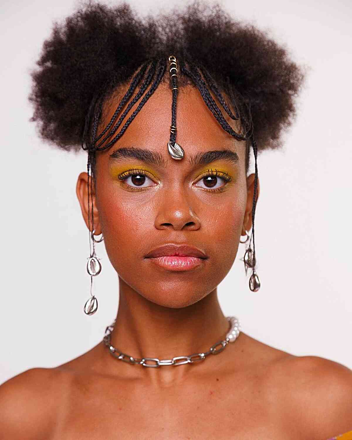 Unique Braided Cut with Space Buns for African-American Ladies