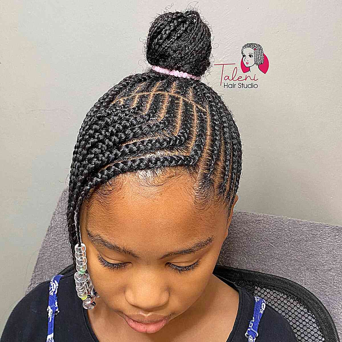 Unique Braided Design for Black Kids with beads and a high bun