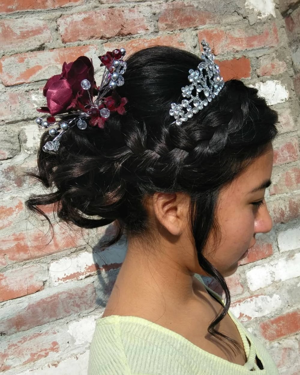 Braided Bun Up Style with Tiara and Flowers for Quinceanera Parties