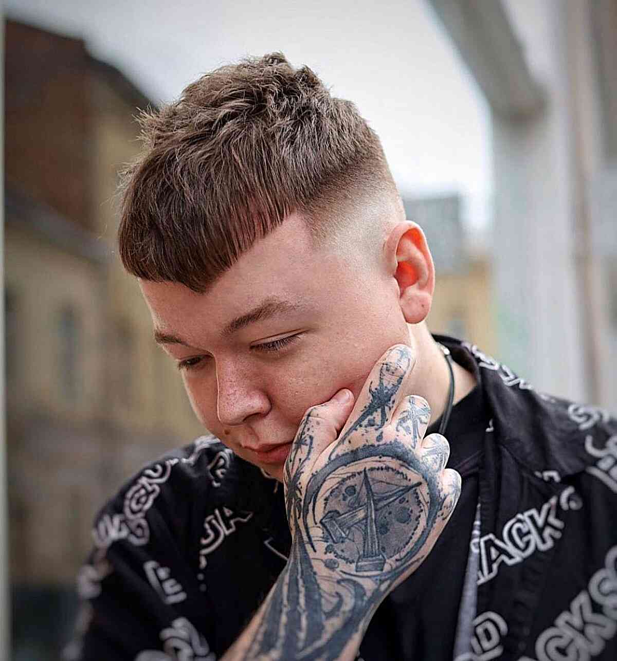 V-Shaped Bangs and a Skin Fade for Men with a funky style