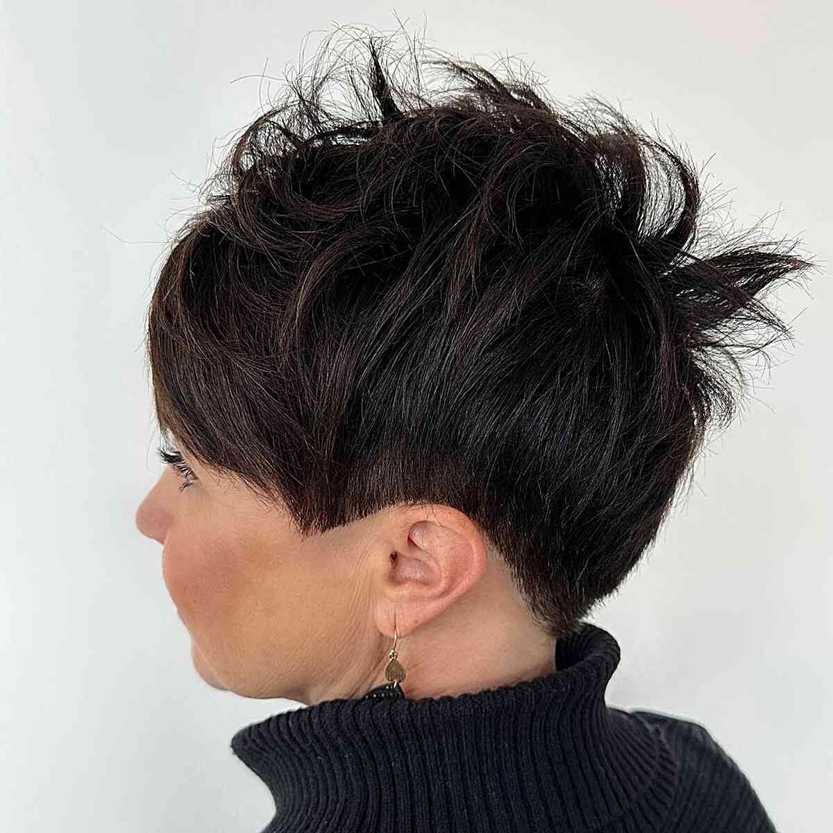 Jet Black Versatile Pixie Cut with a Textured Top for ladies with a low-maintenance style