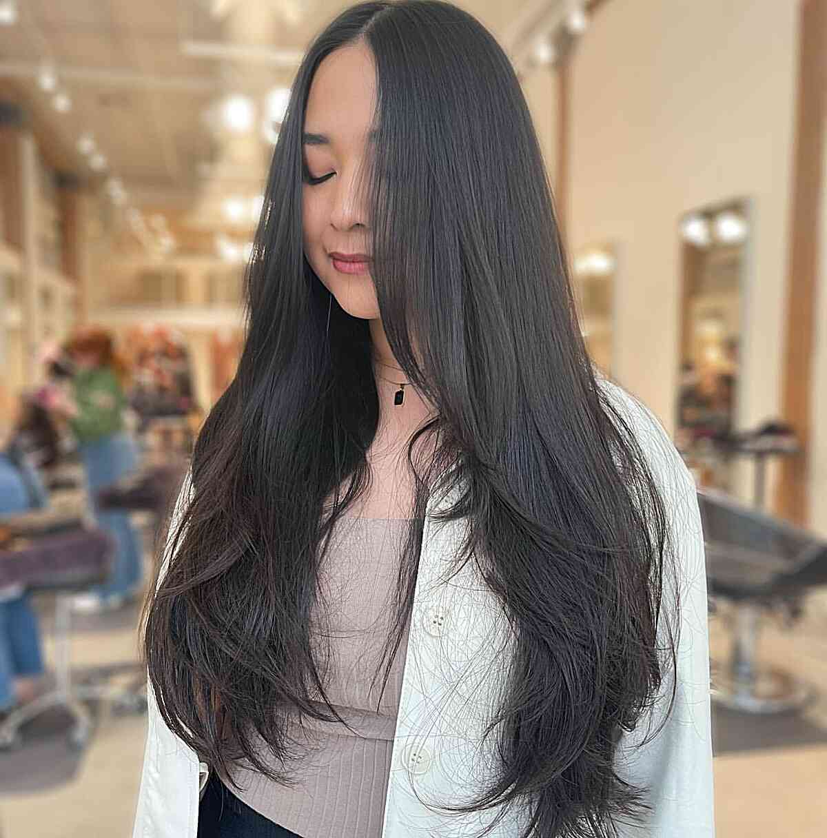 Very Long Middle-Parted Dark Hair with Soft Feathered Layers