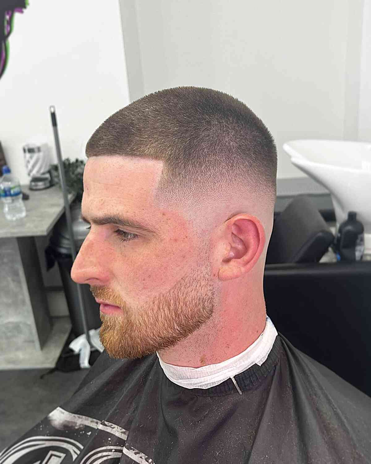 Very Short Buzz Cut Haircut with Skin Mid Fade for Guys with Beard