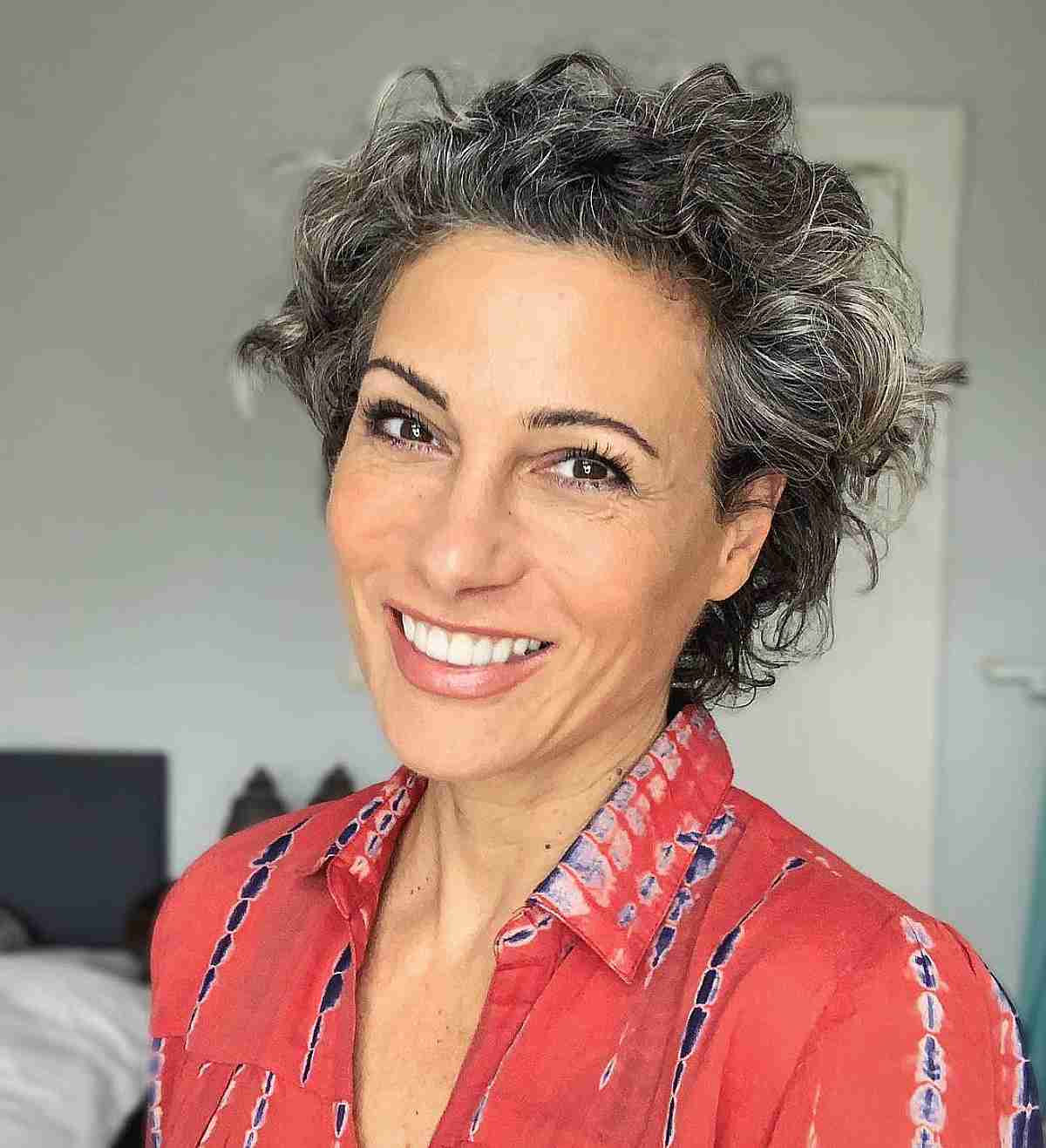 Very Short Curly Cut on Salt-and-Pepper Hair for Women Over 50