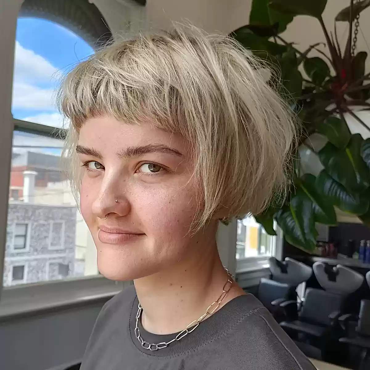Very Short French Choppy Bob with Short Bangs Extra Layering That ends at the jawline