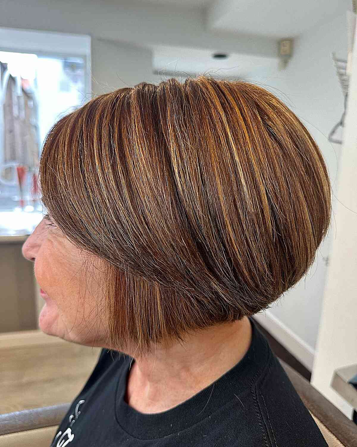 Very Short Graduated Bob with Side-Swept Bangs and Highlights